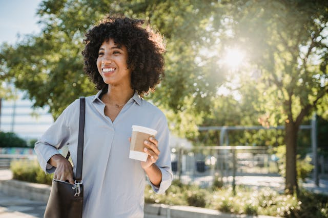 person-outside-enjoying-coffee