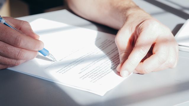 a person reviewing a lease