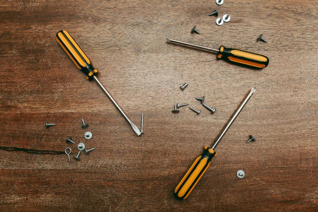 screwdrivers and screws on the floor